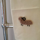 Hand towel linen with wool ram taupe