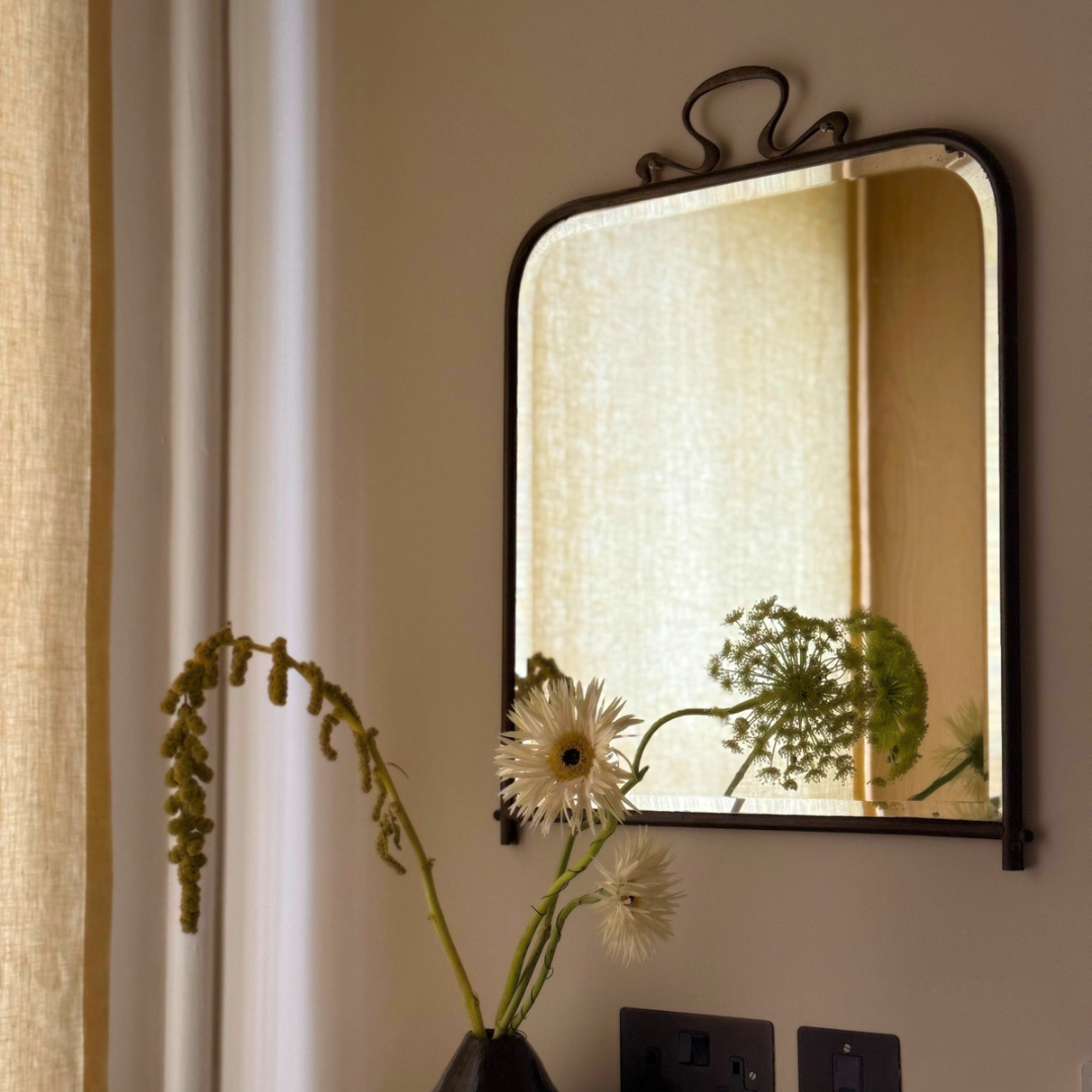 Gunmetal mid century wall mirror