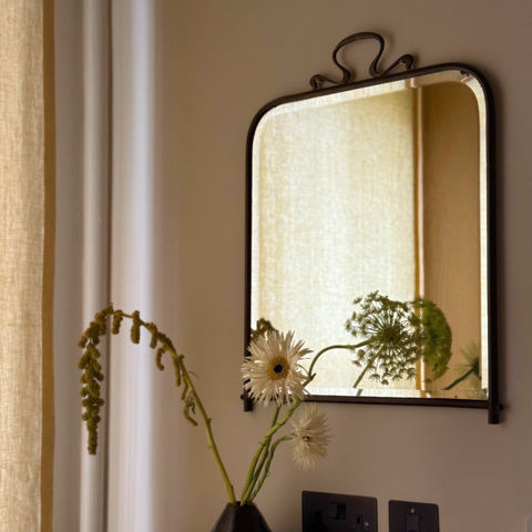 Gunmetal mid century wall mirror