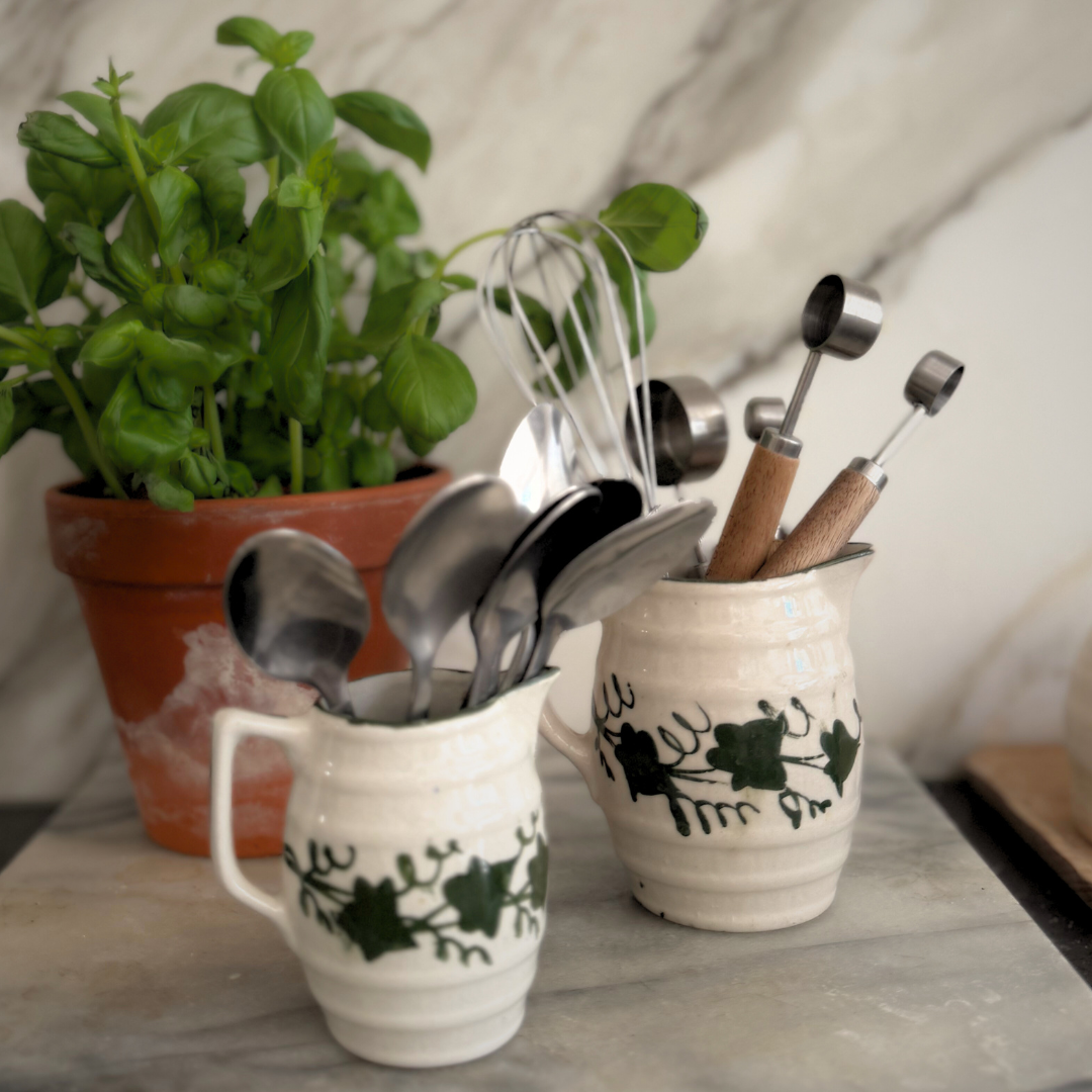 2 jugs with green detail