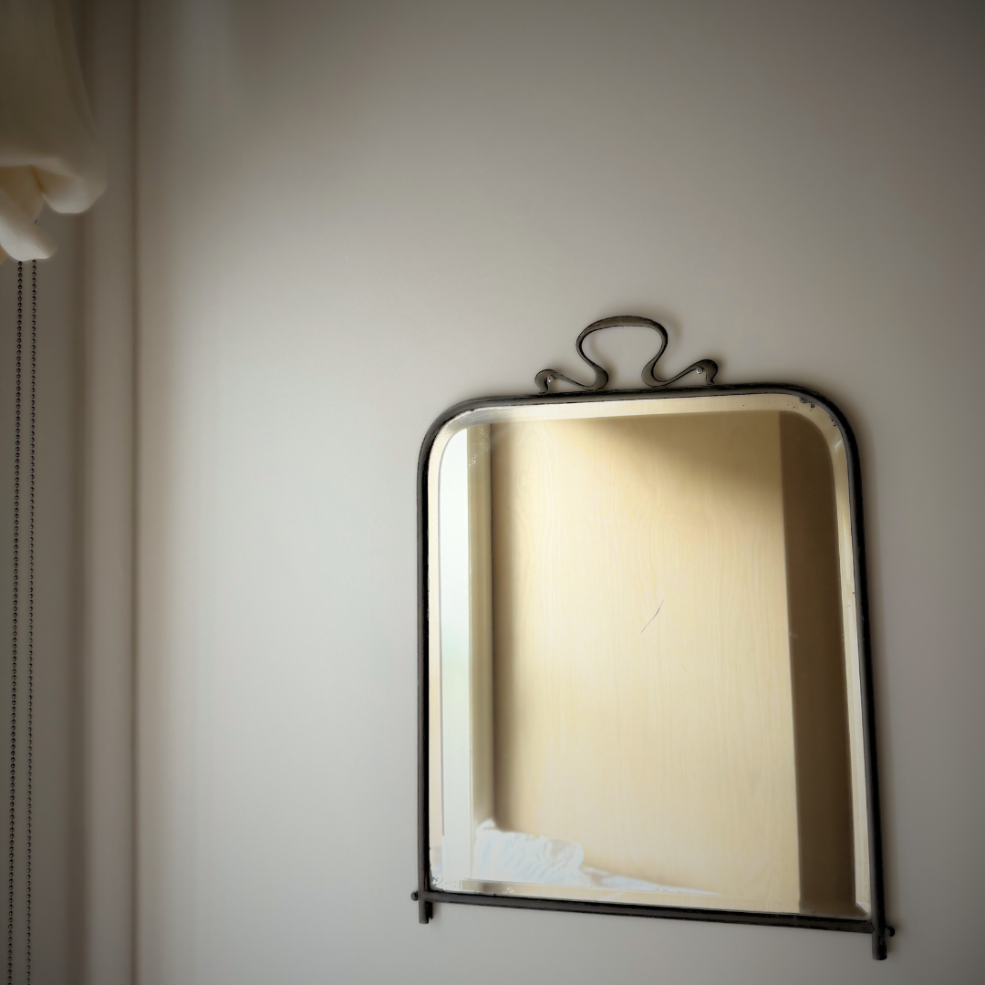 Gunmetal mid century wall mirror