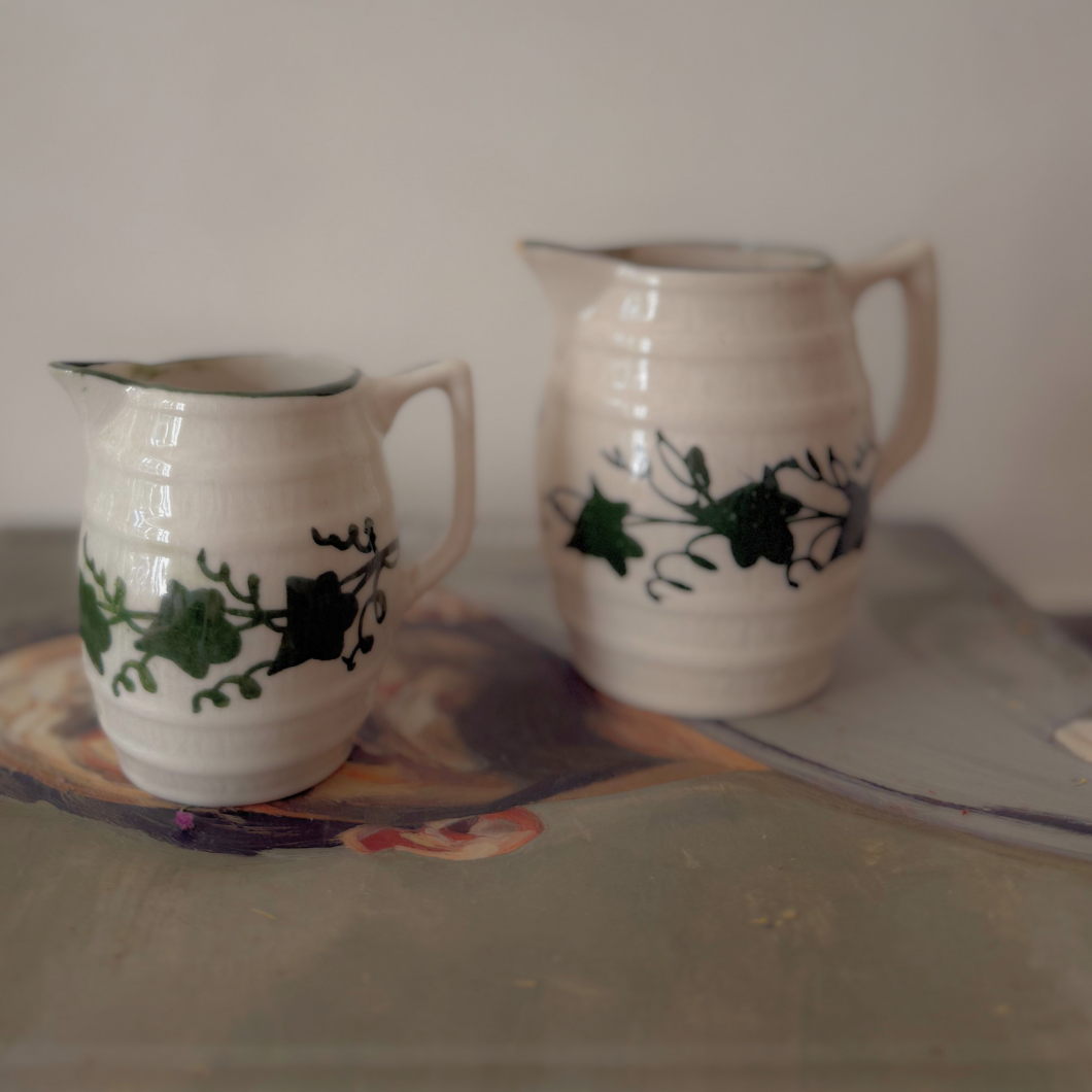 2 jugs with green detail