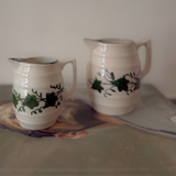 2 jugs with green detail