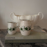 2 jugs with green detail